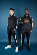 Load image into Gallery viewer, Twin Stripe Badge Joggers - Black/Beige/Mocha
